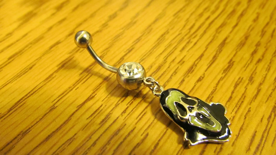 Brilho de esmalte facial assustador com um anel de umbigo/barriga de gema clara - Imagem 4 de 4