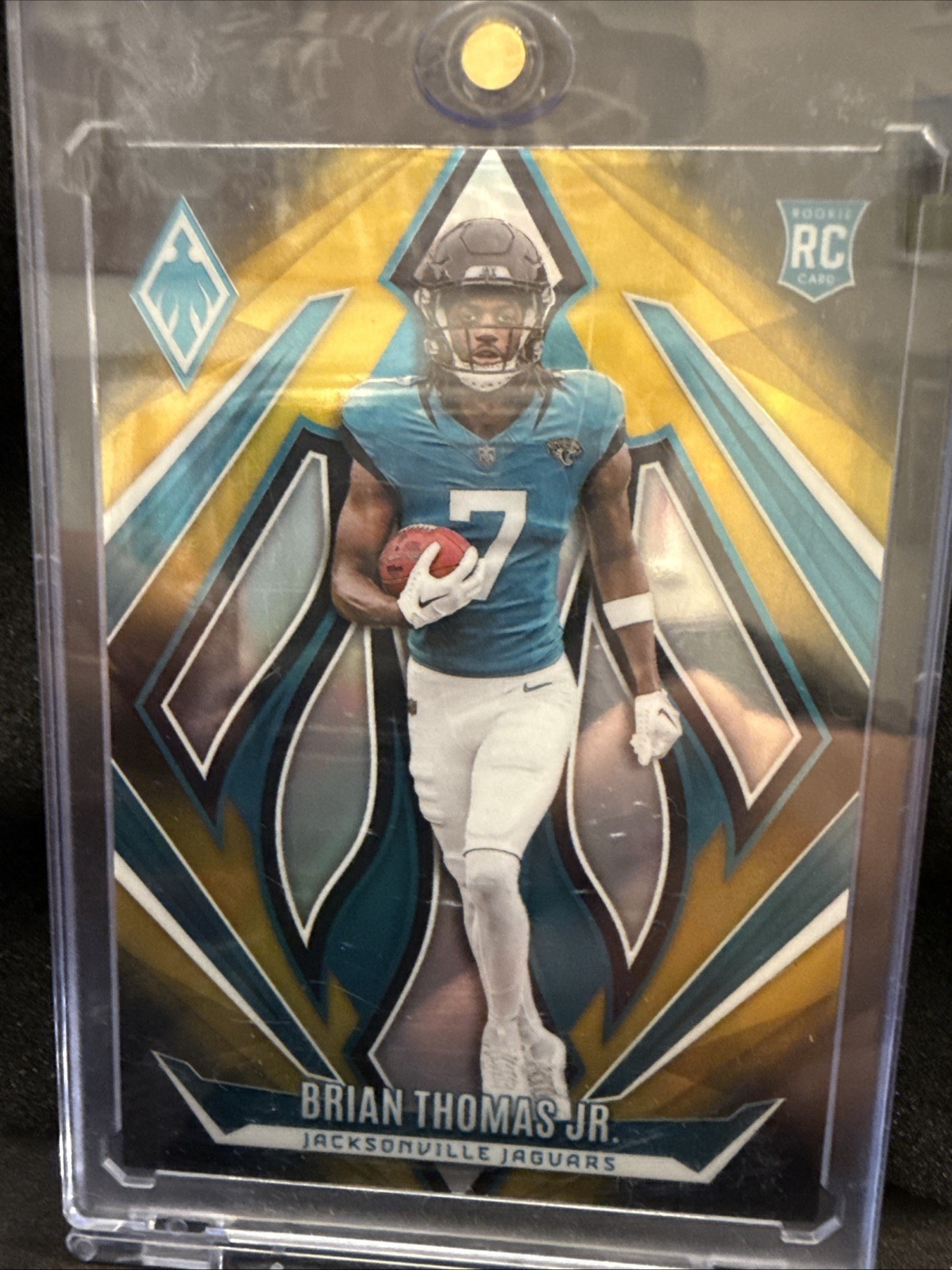 2024 Panini Phoenix - Rookies Brian Thomas Jr. #164 Bronze Fade /125 (RC)