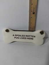 A Spoiled Rotten Pug Lives Here Ceramic dog bone shape 7.7" x 3.2"