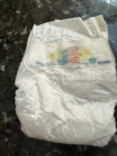 1- One Vintage Pampers Diaper Size Newborn or 1 Sesame Street 2000's