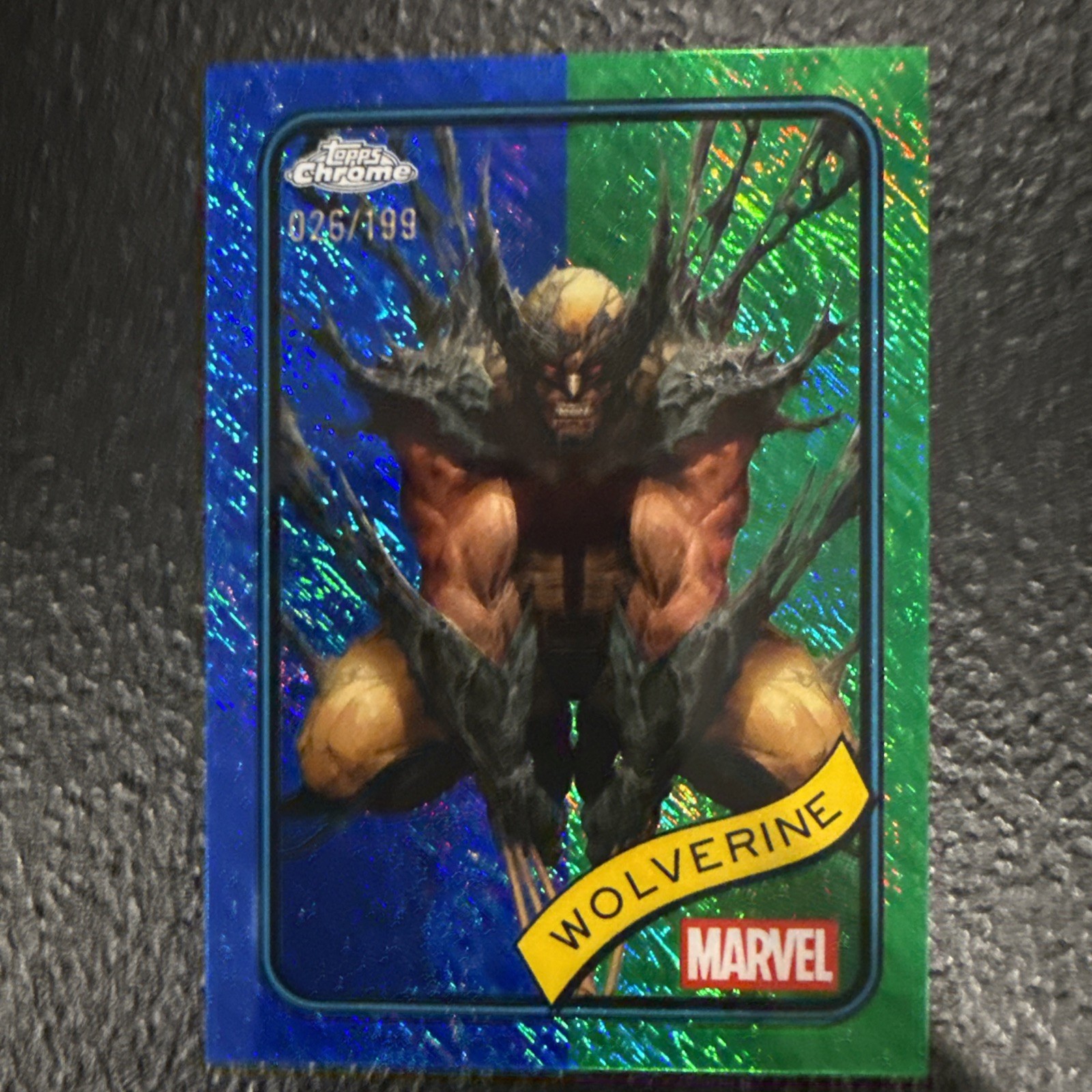 2025 Topps Chrome Marvel #103 Wolverine Blue & Green Shimmer Refractor 26/199