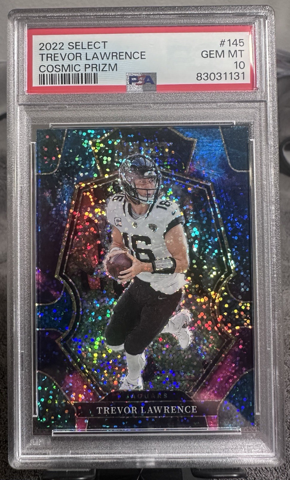 2022 Panini Select - Trevor Lawrence #145 Premier Level Cosmic Prizm. PSA 10