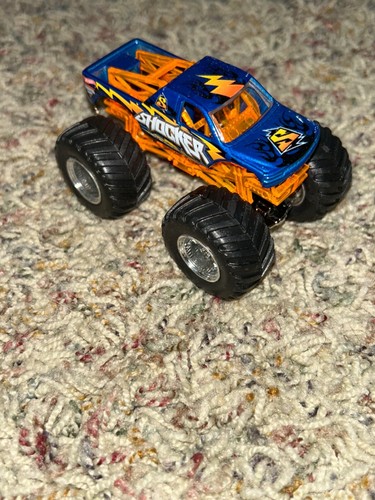 Monster Jam SHOCKER ORANGE BLUE Silver Rims Hot Wheels - Picture 2 of 3