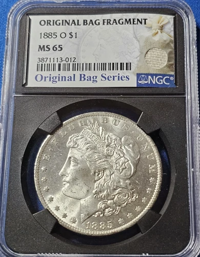 1885-O Morgan Silver Dollar MS-65 NGC (Original Bag Fragment)