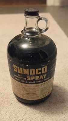 Vintage Sunoco Horticultural Dormant Spray Oil in a 1-gallon glass jug
