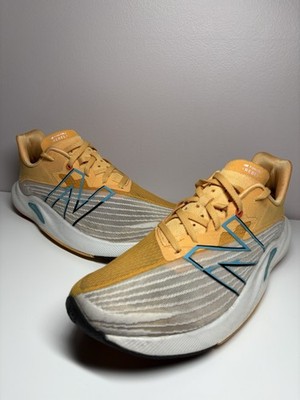 New Balance Fuelcell Rebel Mens Yellow Blue Shoes Sneaker Running - Size 8.5