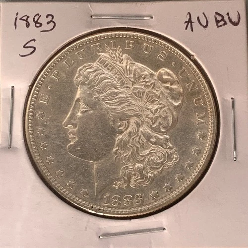 1883 S Morgan Silver Dollar. About Uncirculated