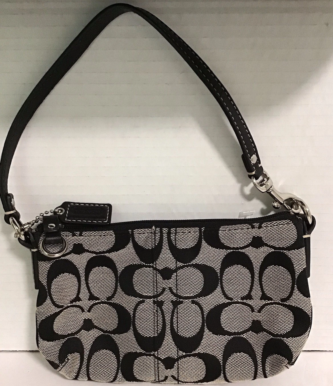 Borsa a tracolla Coach nera tela bordo pelle con polso omaggio usata in ottime condizioni