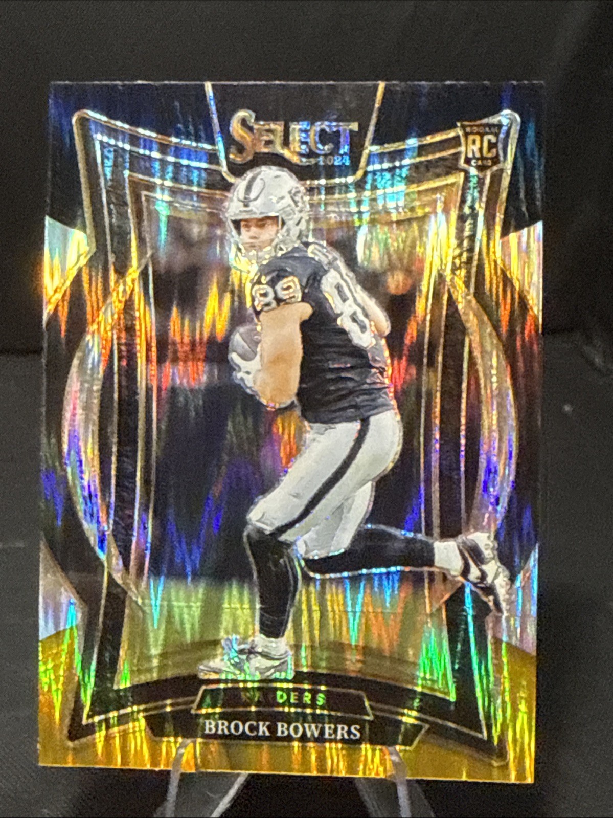 2024 Select Brock Bowers Concourse RC Black and Orange Prizm Shock #31 SP HIT