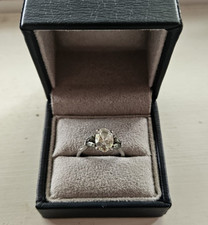 Taylor & Hart Engagement Ring, 1.75ct Oval Diamond with Marquise Green Sapphires