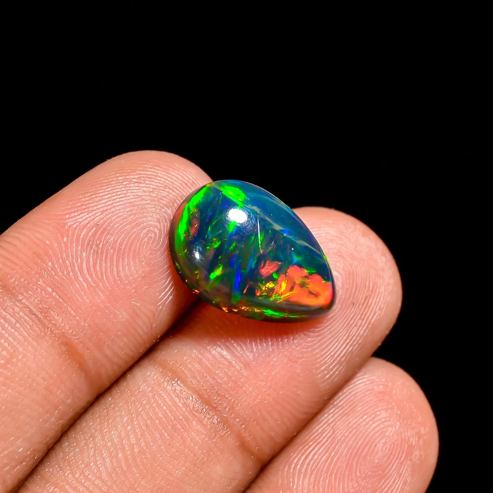 Elección del joyero: cabujón de ópalo Welo negro de 4,00 quilates - ovalado de 14x9 mm - impresionante fuego Foto 2 de 3