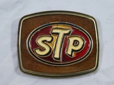 STP Motor Oil Company Belt Buckle 1979 Raintree Enamel Metal Men's Advertisment