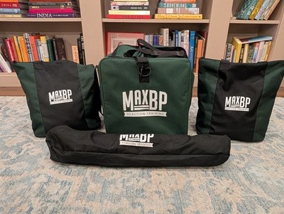 MaxBP Pro Pitching Machine, carrying bag and accessories.