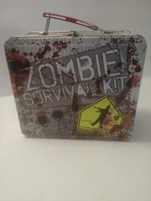 ZOMBIE SURVIVAL KIT 2011 LUNCH BOX WITH PICNIC SETTING NAPKINS x4,TABLE TOPPERx3