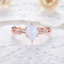 1.3 CT Pear Cut Opal 14k Rose Gold Classy Retro Engagement Ring