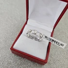 Moissanite band ring in platinum over  Sterling silver