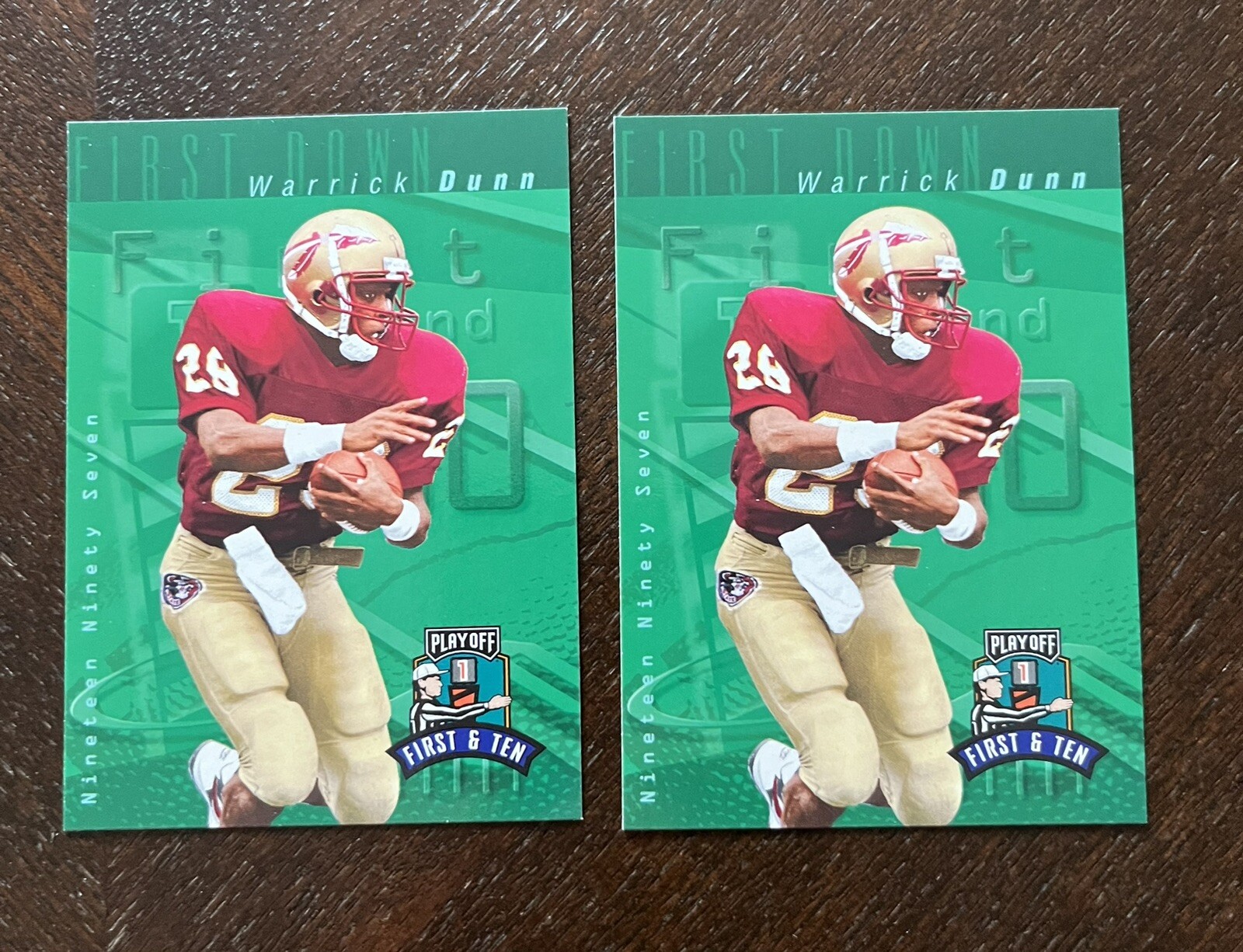 Warrick Dunn #31 Football Cards 1997 Playoff 1st & 10 trading card — raw and PSA graded price guide