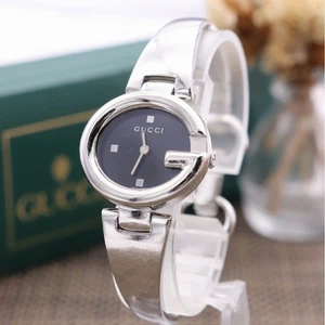 Montre femme GUCCI 134,5 Guccissima SS cadran noir bracelet 2 aiguilles d'occasion pile neuve