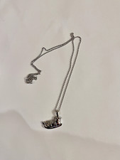 silver ice skate necklace pendant