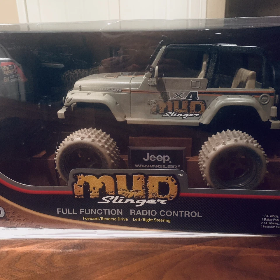 Nuevo R/C Bright Mud Slinger Jeep Wrangler Rubicon nuevo en caja Foto 2 de 4