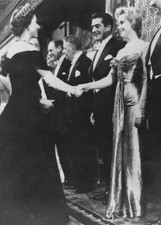Queen Elizabeth II shaking hands Marilyn Monroe who stands next- 1956 Old Photo