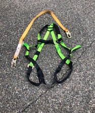 full-body safety harness with a shock-absorbing lanyard