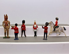 6 Toy Solders Lead . British One is on horse Marked Britains LTD. R