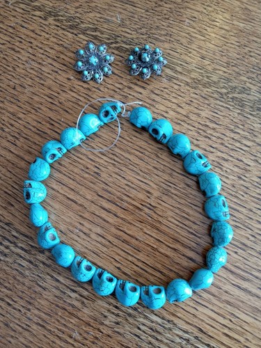 Turquoise skull stone beads and vintage turquoise pins. Victorian pins