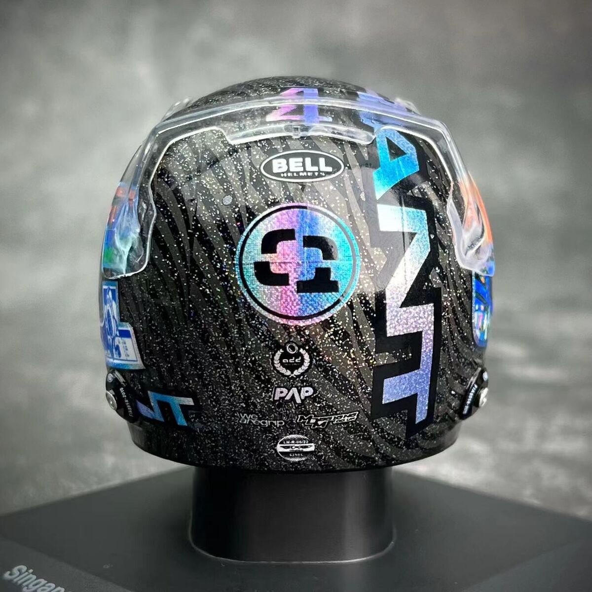 Spark 1/5 Helmet replica McLaren F1 Team Singapore GP 2023 Spark 1/5 Helmet replica McLaren F1 Team Singapore GP 2023