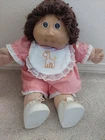 1985 Brown Haired Cabbage Patch Doll With Original Birth & Adoption Certificate