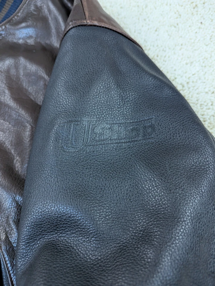 Chaqueta de cuero Roots para hombre mediana marrón negra abrigo acolchado de bombardero universitario vintage Foto 3 de 4