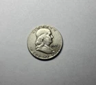 1957 Benjamin Franklin 90% Silver Half Dollar Coin  0.36169 troy ounces.