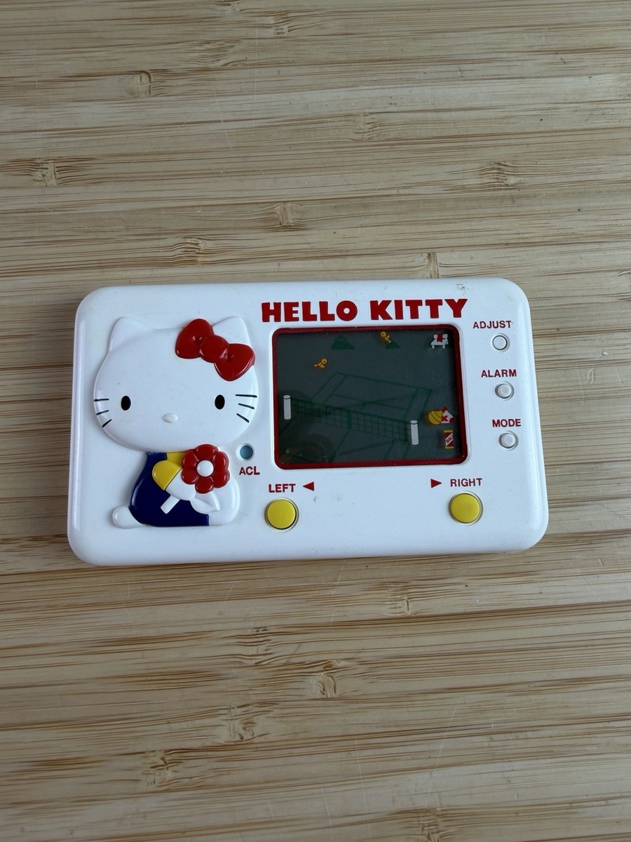 LCD HELLO KITTY TENNIS SCHOOL Handheld Console System Tomy 2440