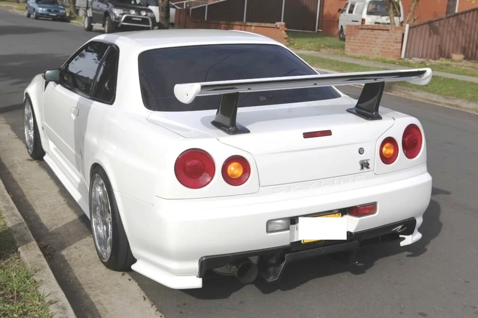 Elevadores de alerón de fibra de carbono estilo mina PARA Nissan Skyline R34 GTR GTT Foto 3 de 3