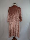 Rose gold pink velvet cover up jacket with long sleeves and back, displayed on mannequin against plain white background.