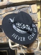 Western black felt fedora, custom burned and painted design, feather trim