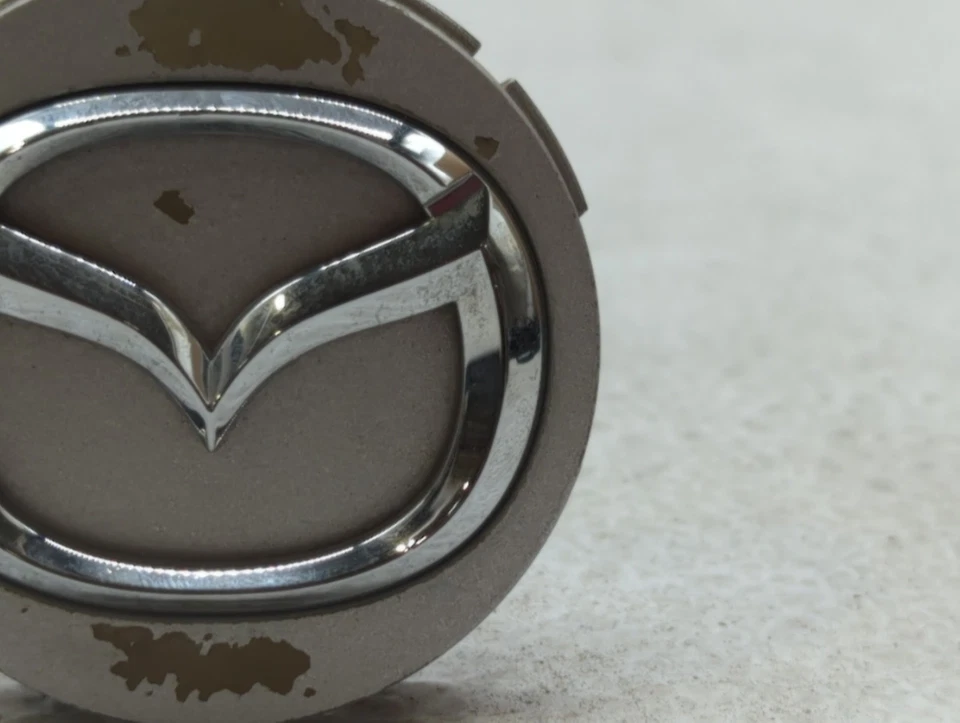 Mazda 2010 5 llantas tapa central plateada Padia Foto 3 de 4