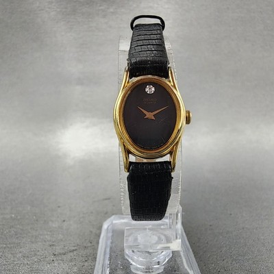 Seiko Watch Women 16mm Black Dial Gold Tone Oval 2c20-6399 New