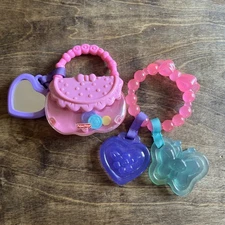 Fisher-Price Brilliant Basics Baby's First Purse & Teething Bracelet Toy