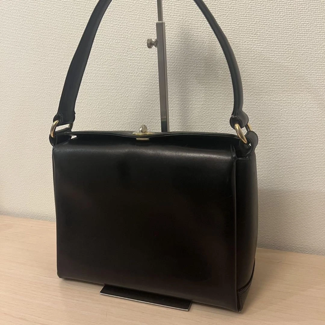 Ancien sac formel Gucci Gold Hardware cuir noir cadenas #PGC07H