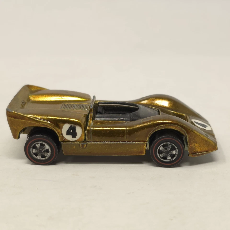 Hot Wheels Redline McLaren M6A 1968 dorado hecho en Estados Unidos Foto 2 de 4
