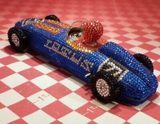 TIN WIND-UP LOTUS CAR - DECORATED TOY - NICE SHAPE
