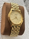 Seiko Quart Dress Watch Men V701-7A29 Gold Dial Bracelet Link Band New Bat