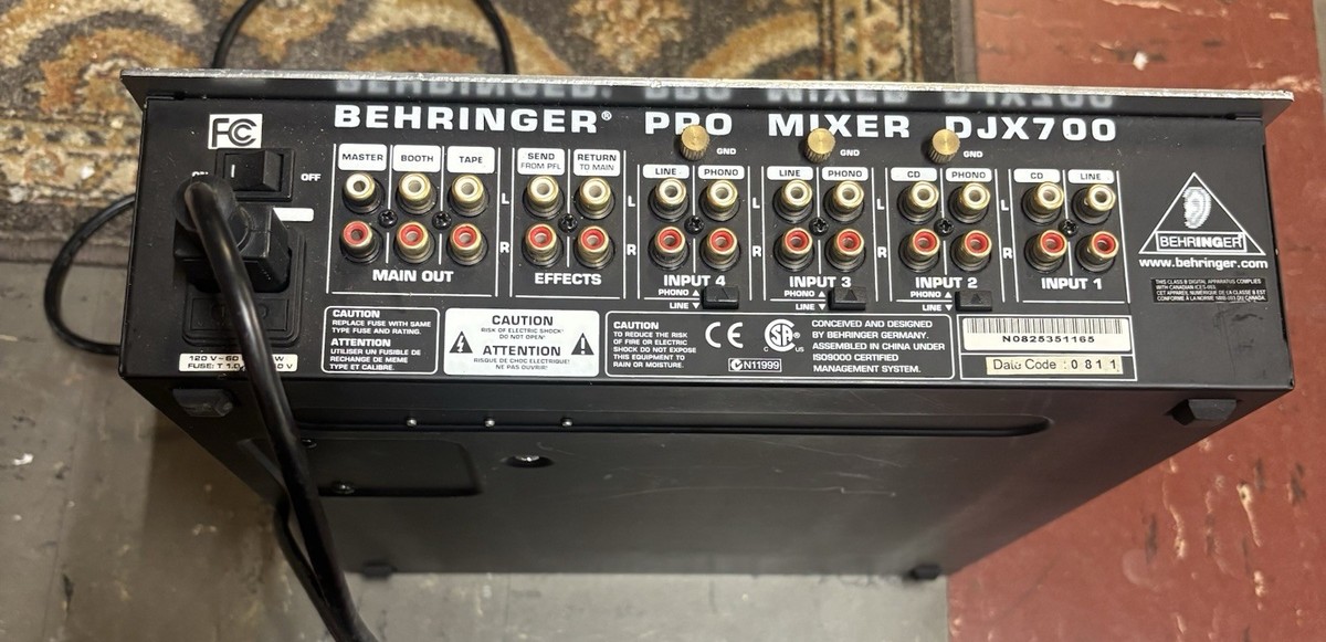 Behringer DJX700 Professional DJ Mixer Powers up Untested. Chord