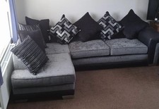 DFS GREY L SHAPED SOFA VERY GOOD CONDITION INCLUDING 8 CUSHIONS. H273xW177xH72