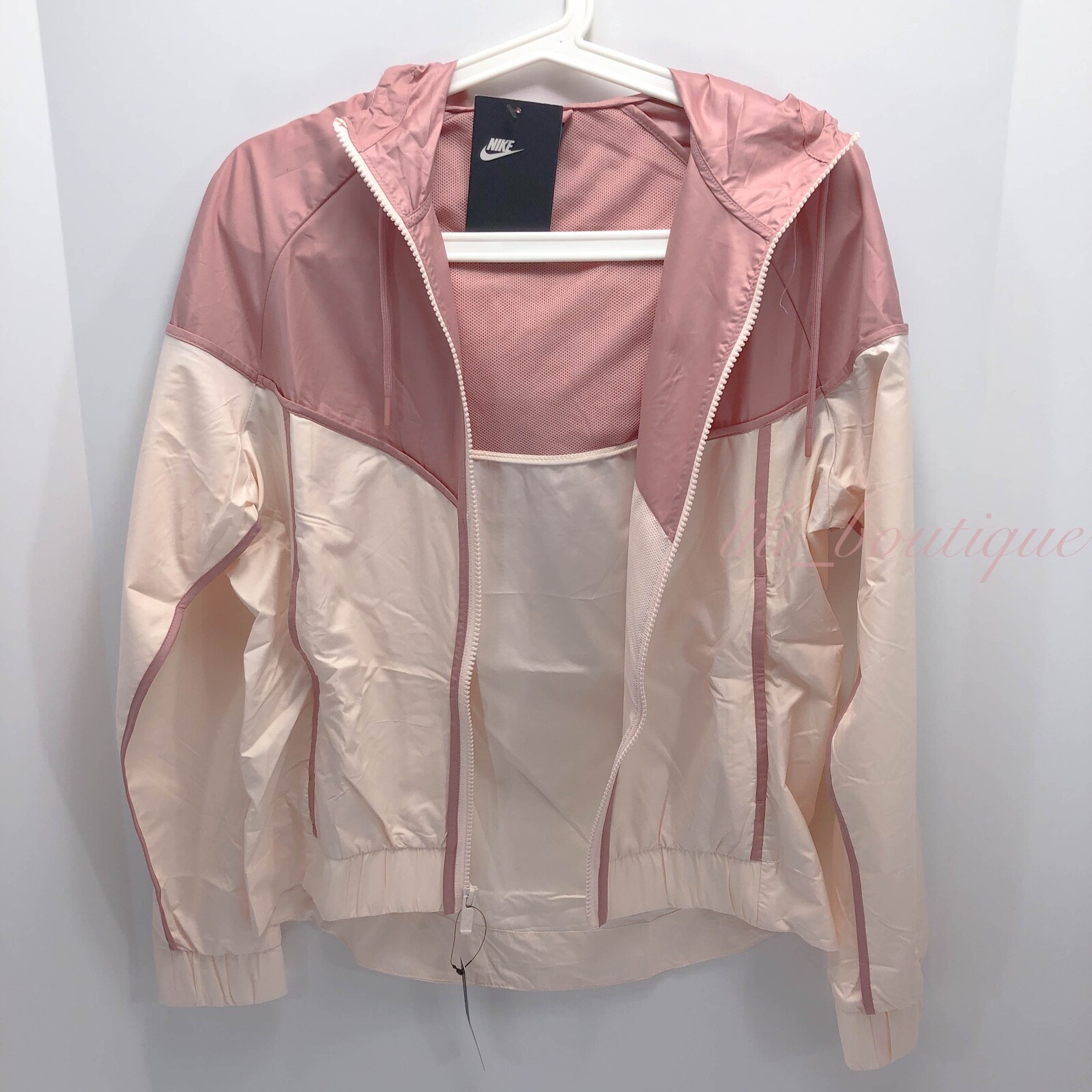 rust pink nike windbreaker