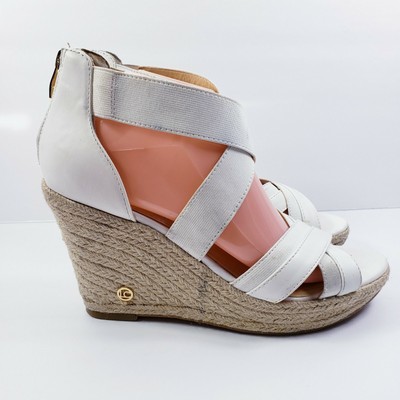 white elastic sandals