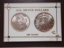 USA: 1890 silver Morgan & 1990 silver Eagle pair; in perspex frame; FREE UK pp