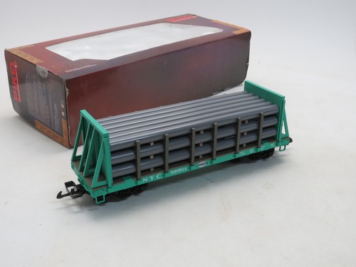 PIKO 38739 NYC mampara flatcar con carga por tubería New York Central #381954, calibre G | Zustand: Used