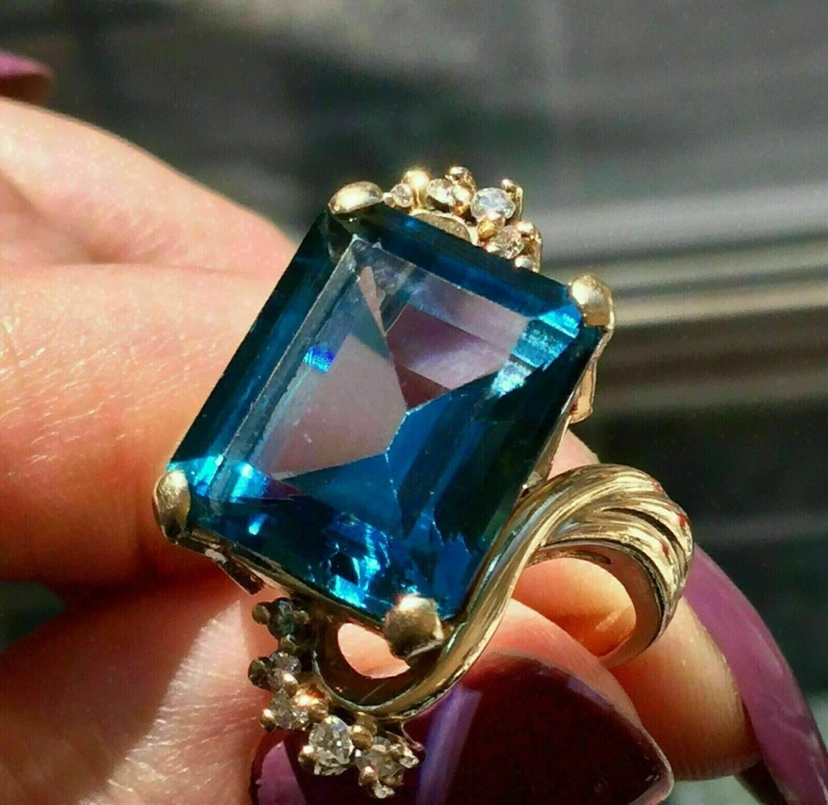 Emerald cut london on sale blue topaz ring